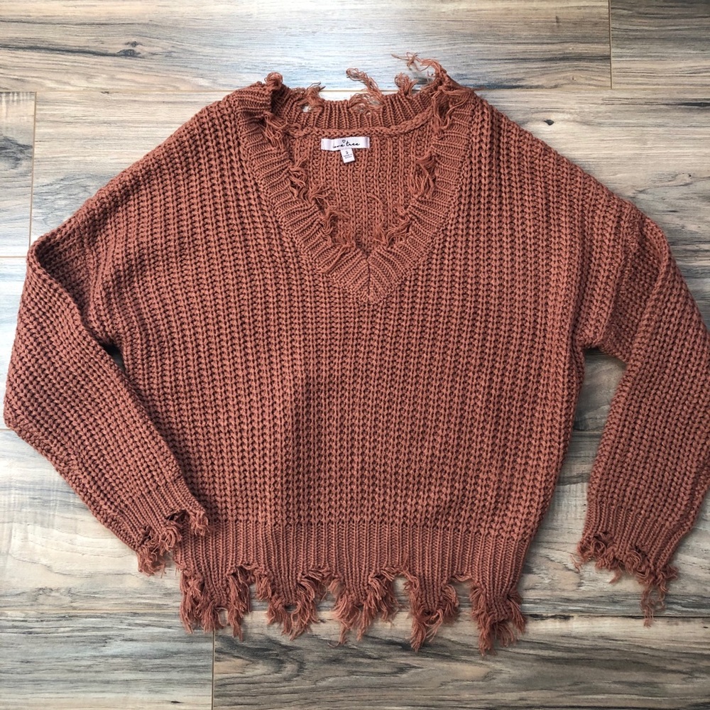 Distressed sweater